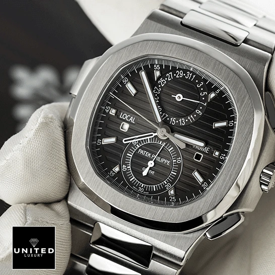Patek Philippe Travel Time Steel Replica 2 Patek Philippe Geneve Black Dial Steel Case Replica on the hand