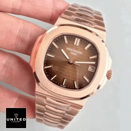 Patek Philippe Nautilus Rose Gold Dial Replica on the hand